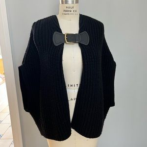 Coach wool sleeveless sweater with black leather buckle closer